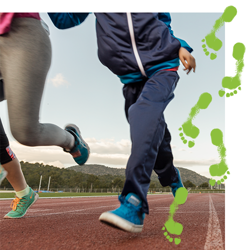Two people running on a track with a trail green footprints over the image Two people running on a track with a trail green footprints over the image